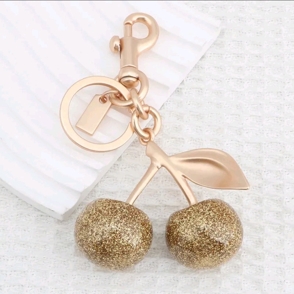 Gold Sparkle Cherry Purse Charm
